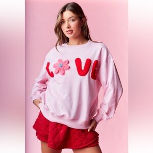 117. “Love” Patch French Terry sweatshirt in pink and red